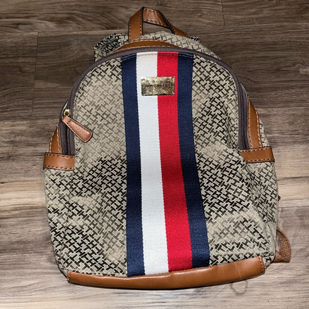 Red white and blue backpack with gold details